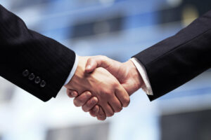 HOA lawyer and client shaking hands